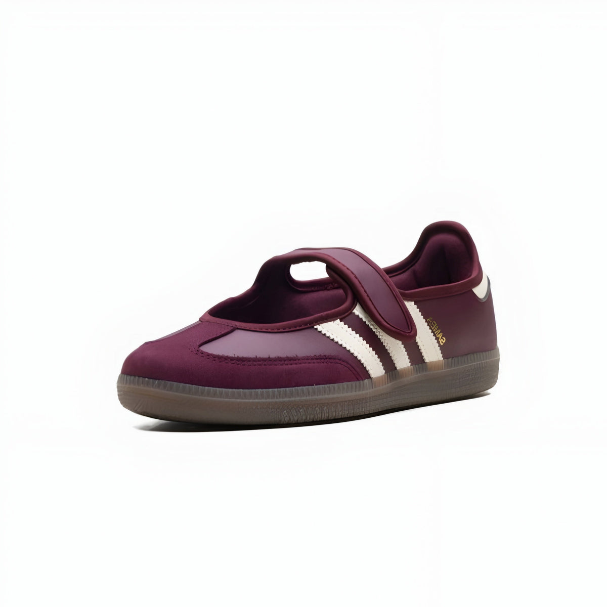 A single vintage-style low-top sneaker in deep burgundy with white side stripes and a brown gum sole, photographed from a three-quarters angle on a white background.