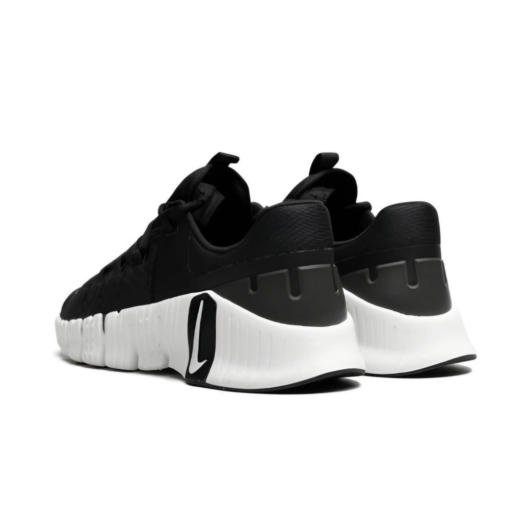 Black and white sneakers on a white background