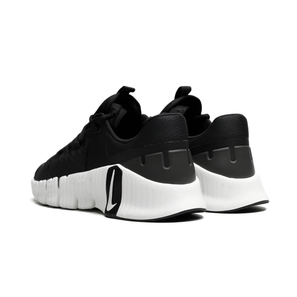 Black and white sneakers on a white background