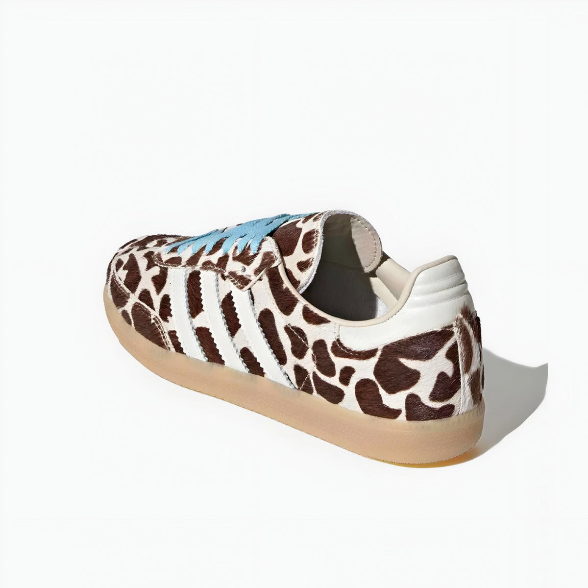 Adidas samba Sneaker with a giraffe pattern on a white background
